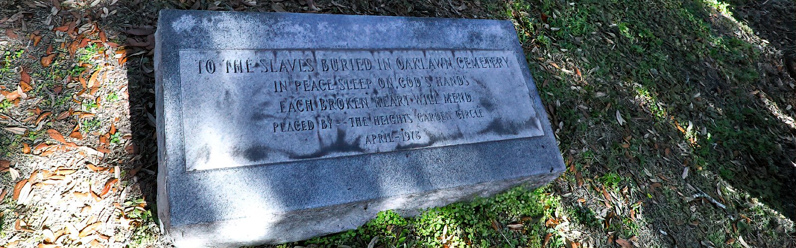 In 1978, the Heights Garden Circle placed a granite marker over the Black burial section as a tribute that reads "To the slaves buried in Oaklawn Cemetery. In peace sleep on God's hands. Each broken heart will mend."