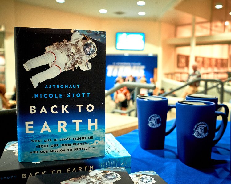 NASA astronaut Nicole Stott's wrote a book about the lessons living and working together in space can teach us about living together on Earth.