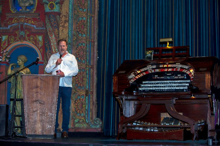 Tampa City Council member Bill Carlson addresses the crowd before Saturday's premier of "La Gaceta The Documentary: 100 Years and 3 Generations Behind America's Only Tri-lingual Newspaper."