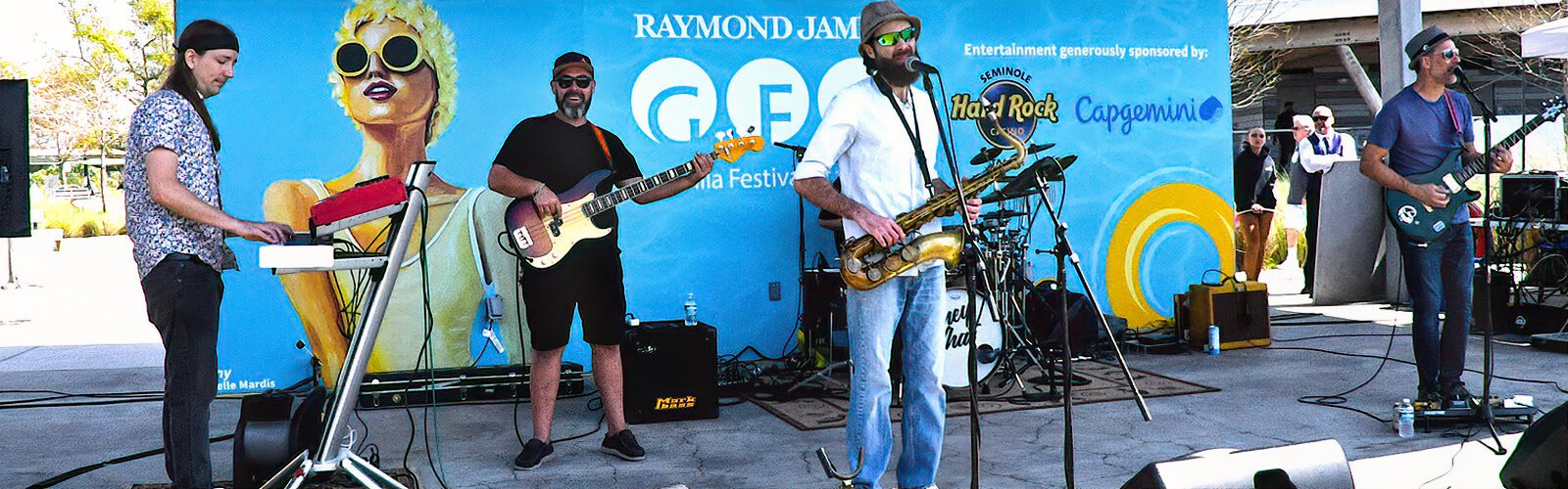 The Dunedin-based band Shoeless Soul performs its mix of jazz, rock and reggae on stage at the Gasparilla Festival of the Arts. A full lineup of performers entertained the crowd during the two-day event.