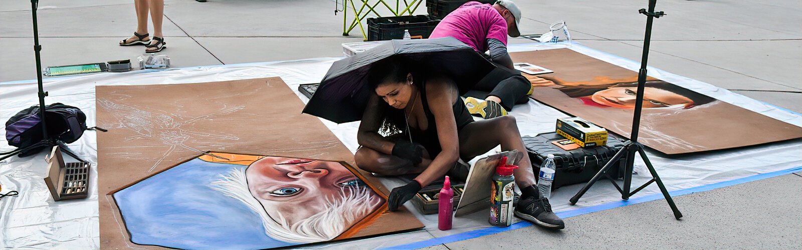 St Petersburg-based chalk artist Laura Thomas takes part in the Tampa Bay Businesses for Culture and the Arts Chalk Walk, which gives commissioned artists the opportunity to show their talents live through 8' x 4' chalk drawings.