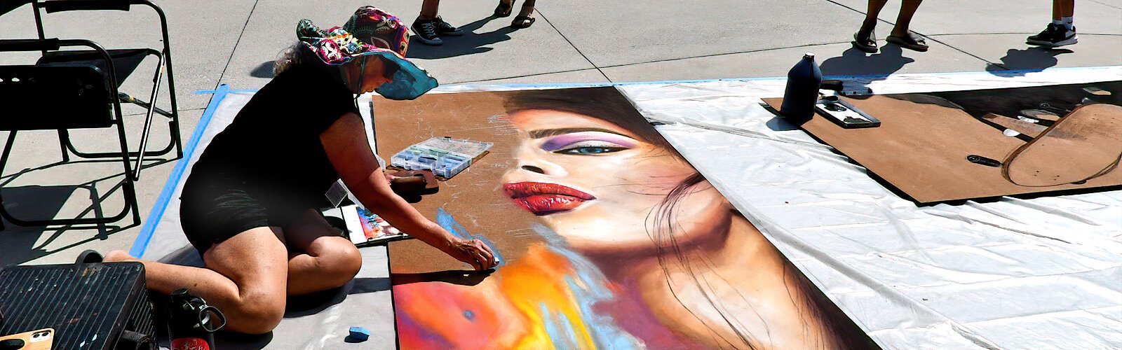 Ellenton-based painter, muralist and chalk artist Hilary Frambes says creating a chalk drawing live is like performance art, connecting directly with the viewers right in the moment.