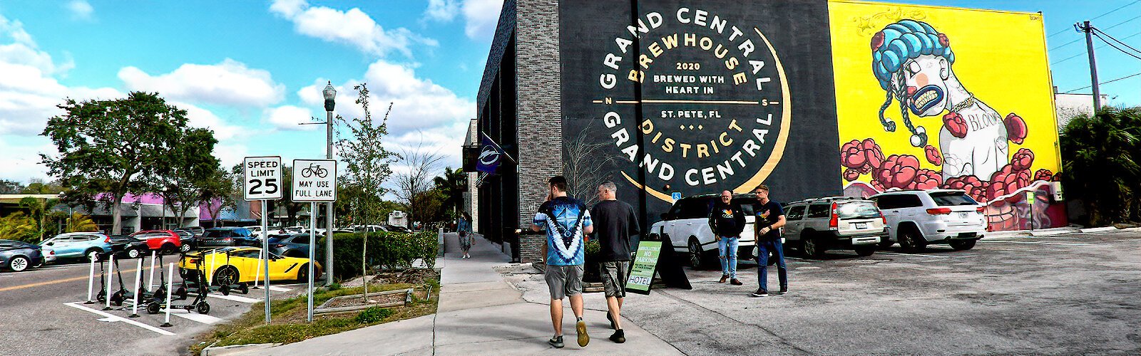 Covering part of the wall at Grand Central Brewhouse is a mural the artist iBOMS created for the 2020 SHINE Mural Festival to draw attention to red tide, the toxic algae that periodically affects coastal areas.