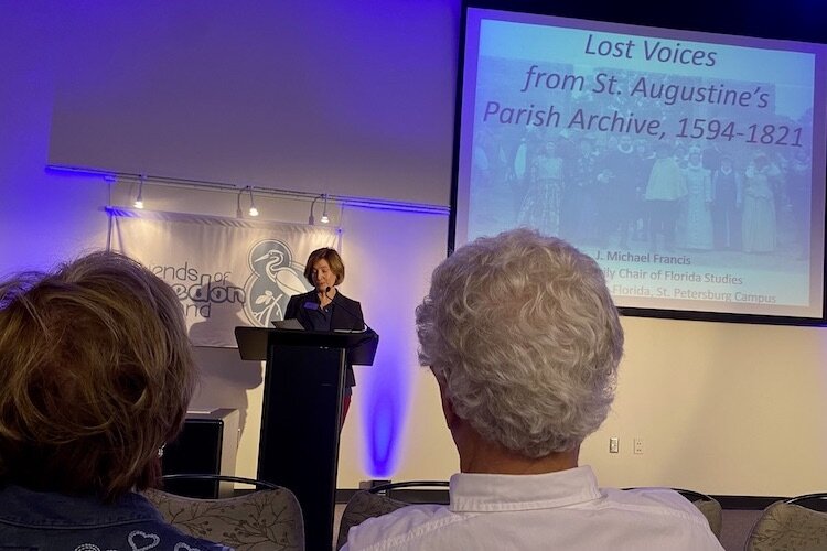 Nancy Dalence, Director of Education at the Tampa Bay History Center, welcomes guests to “Florida Conversations’’ at Weedon Island on March 25, 2023.