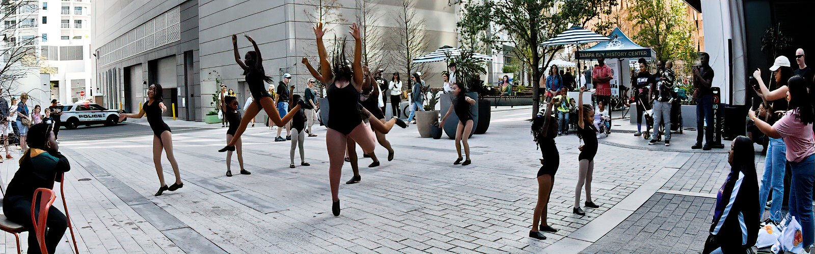 Young dancers from the Golden Dolls Dance Academy perform at Raybon Plaza and entertain visitors shopping at The Market at Water Street Tampa.