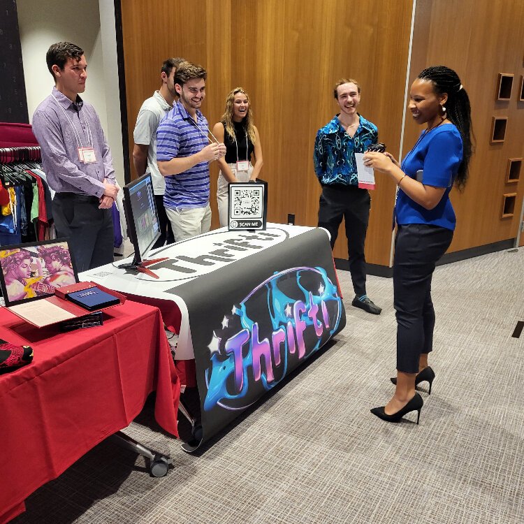 Thrifti founder Logan Martin (second from right) looks to take the experience of shopping for clothes at thrift stores online for buyers and sellers.