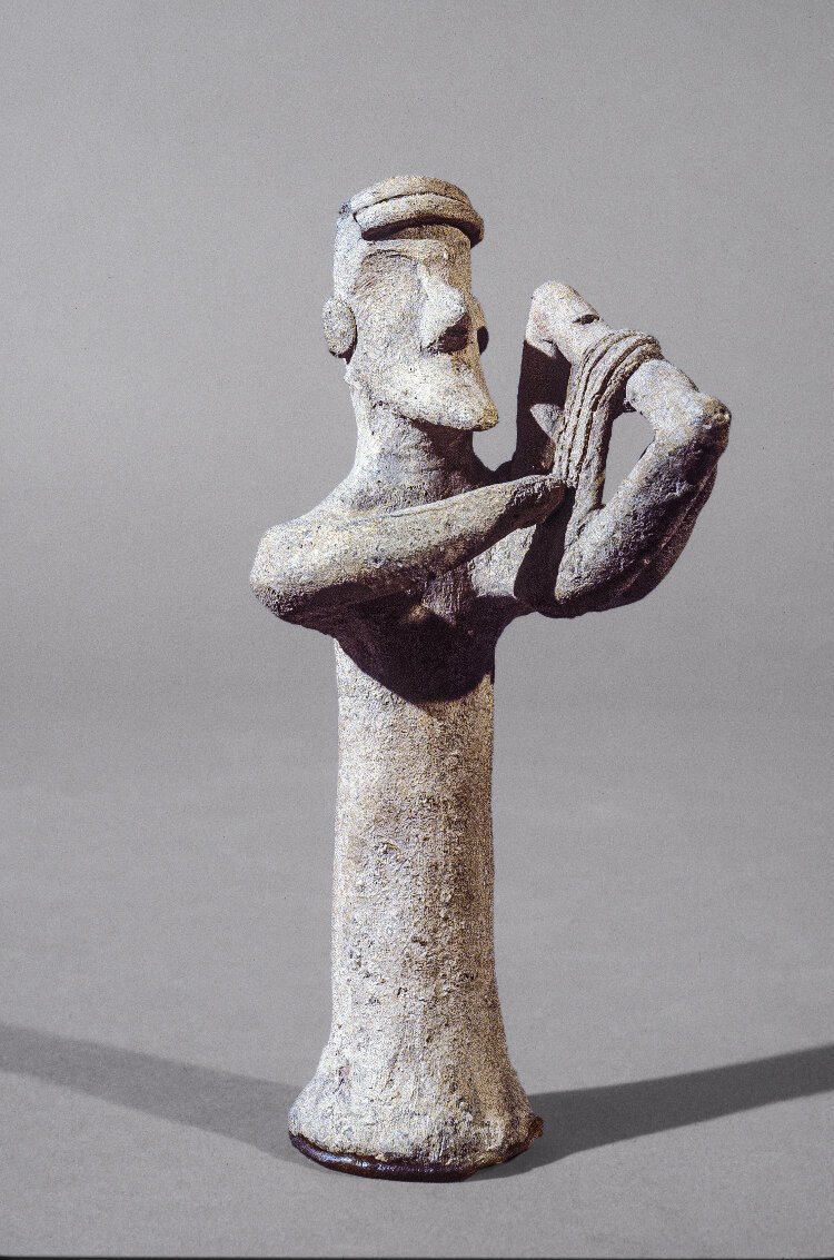 Terracotta statuette of a lyre player, from Cyprus, dating to the Archaic period (ca. 625 - 575BCE).