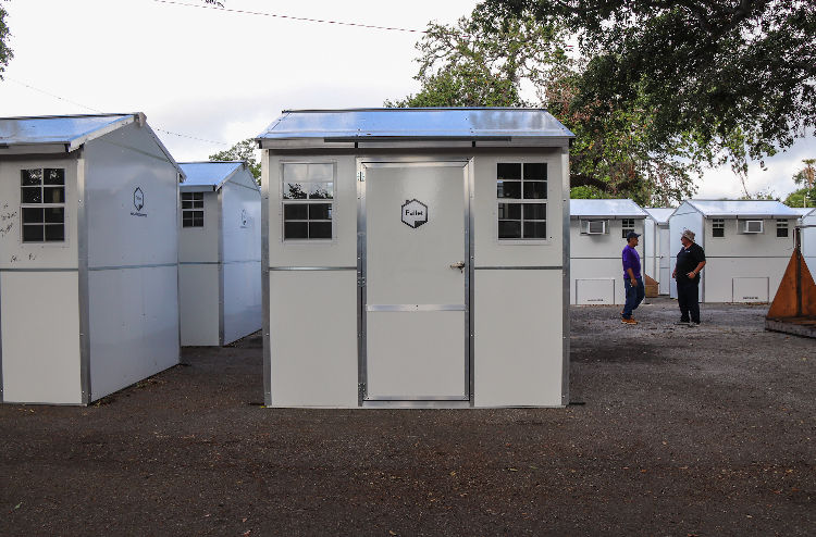 At the Tampa Hope homeless shelter and help center, the arrival of 100 tiny cottages is part of a plan to expand and improve the facilities and resources on-site.