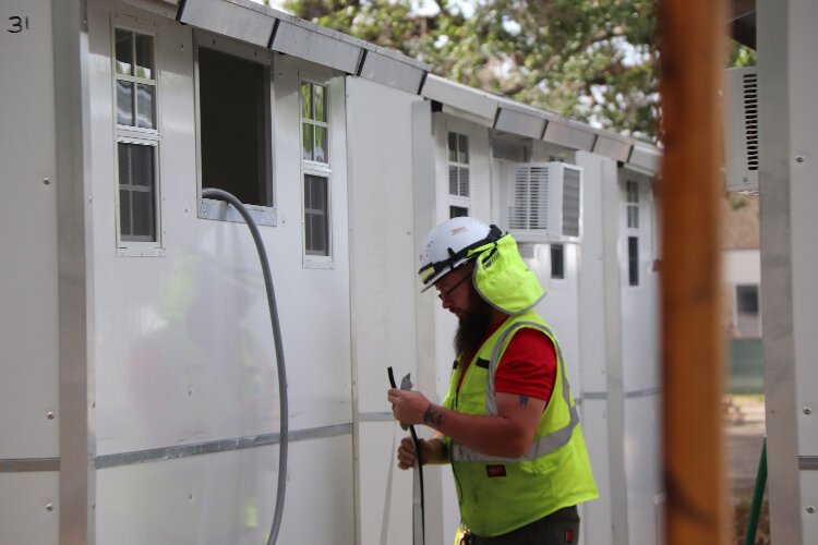 The "Hope Cottages" at Tampa Hope will have air conditioning, heat, a bed, storage space, power outlets, windows and a smoke detector.