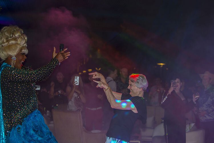 Tampa Museum of Art Trustee Emerita and member of the Board of Directors Cornelia Corbett applauds the performers at Pride & Passion: Sabor.