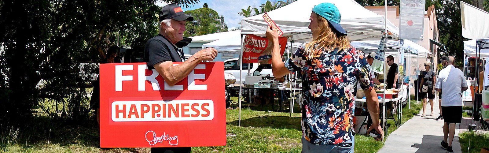 Gary King, a man on a mission since the loss of his son, comes to Gulfport Fresh Market every Tuesday and gives away "HAPPINESS" stickers as part of his "Happiness Experiment" to help people overcome depression and be happier.