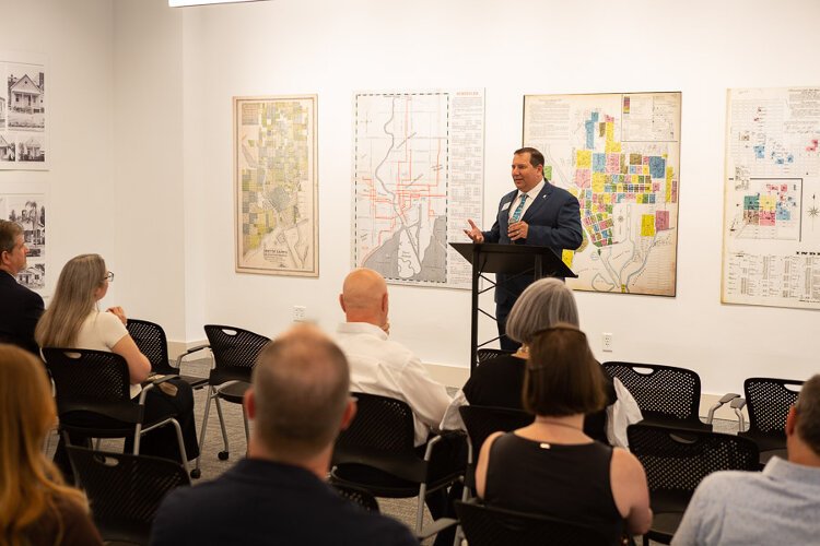 AIA Tampa Bay President Jonathan Moore speaks during the ribbon-cutting ceremony for the Center for Architecture & Design on North Howard Avenue.