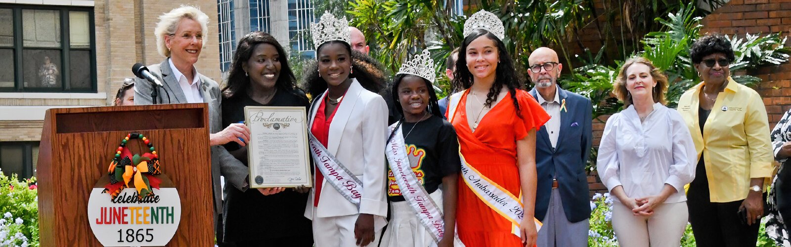 Tampa Mayor Jane Castor presents the “Juneteenth Awareness Day” proclamation to Pastor Philetha Tucker-Johnson, Miss Juneteenth Tampa Bay Jade Gordon, Little Miss Juneteenth Zoey Grace and Juneteenth Ambassador Jarielys Carmona, all of the Tampa Bay.
