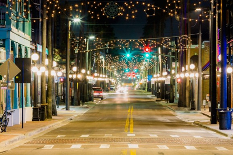 The new archway lighting along East Seventh Avenue is among the recent improvements in the Ybor City Community Redevelopment Area.