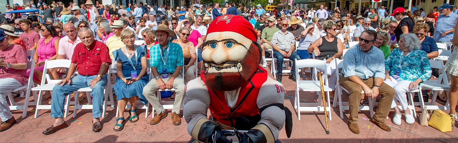 Tampa Bay Bucs mascot Captain Fear grabs a front-row seat for the ribbon cutting to open the rebuilt Coachman Park following the $84 million Imagine Clearwater improvement project.