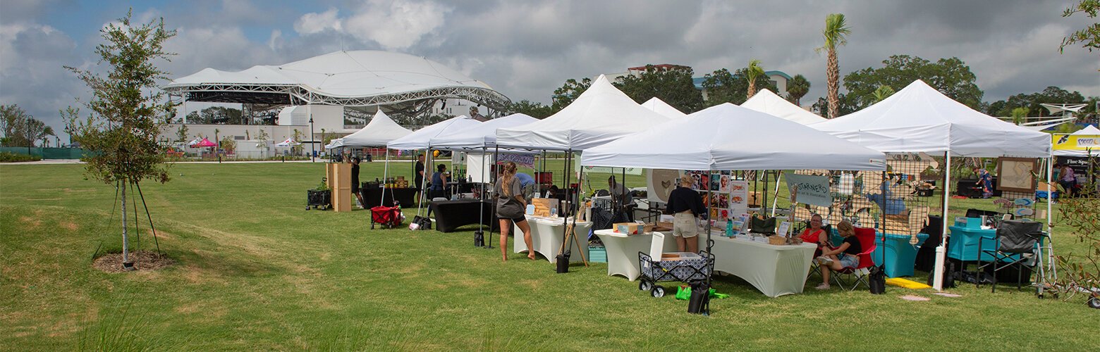 Vendors at the Coachman Park grand opening were selling a variety of goods, including fresh produce.