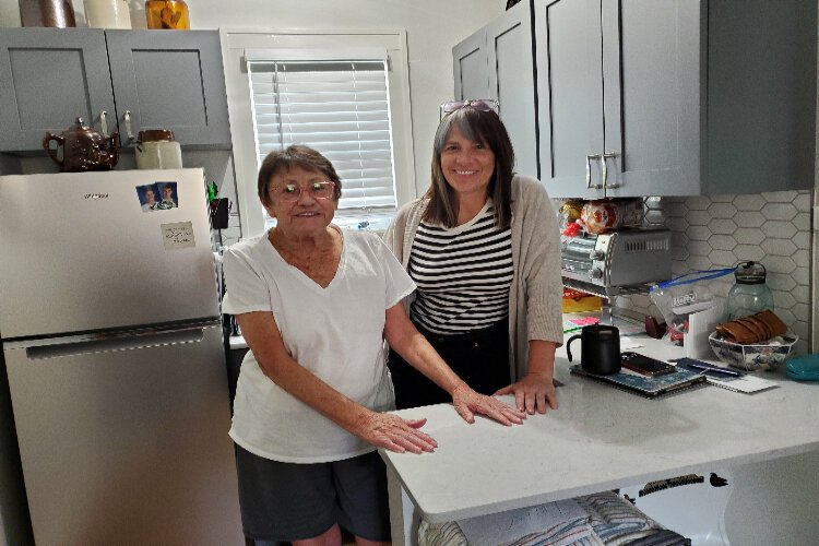 After her husband died, Sue Jenkins moved into a newly built cottage behind her daughter Stacey Jenkins' Seminole Heights bungalow, one example of how accessory dwelling units have emerged as an affordable housing solution.