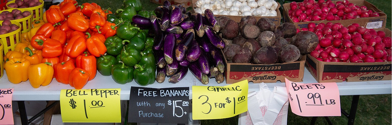 In the vendor area at the Coachman Park grand opening, Peachy Produce had fresh produce for sale.