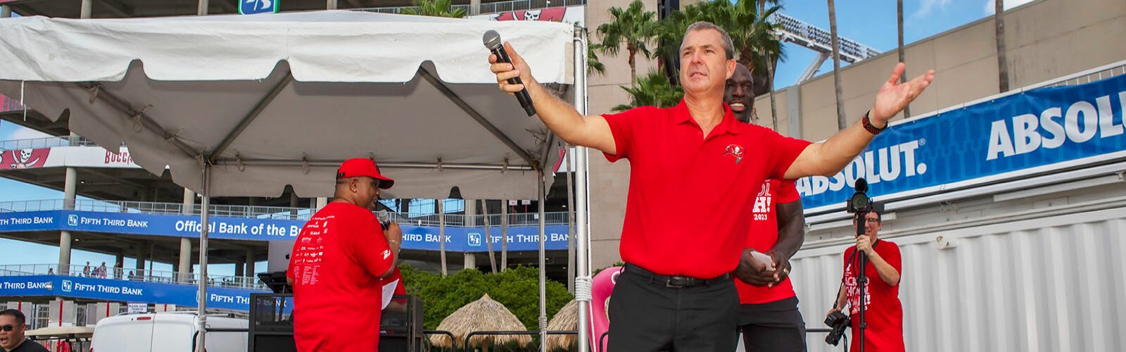 Tampa Bay Buccaneer CEO Brian Ford energized the crowd and encouraged students at the Bullard's Bullard Family Foundation’s sixth annual Back to School Bash at Raymond James Stadium. 