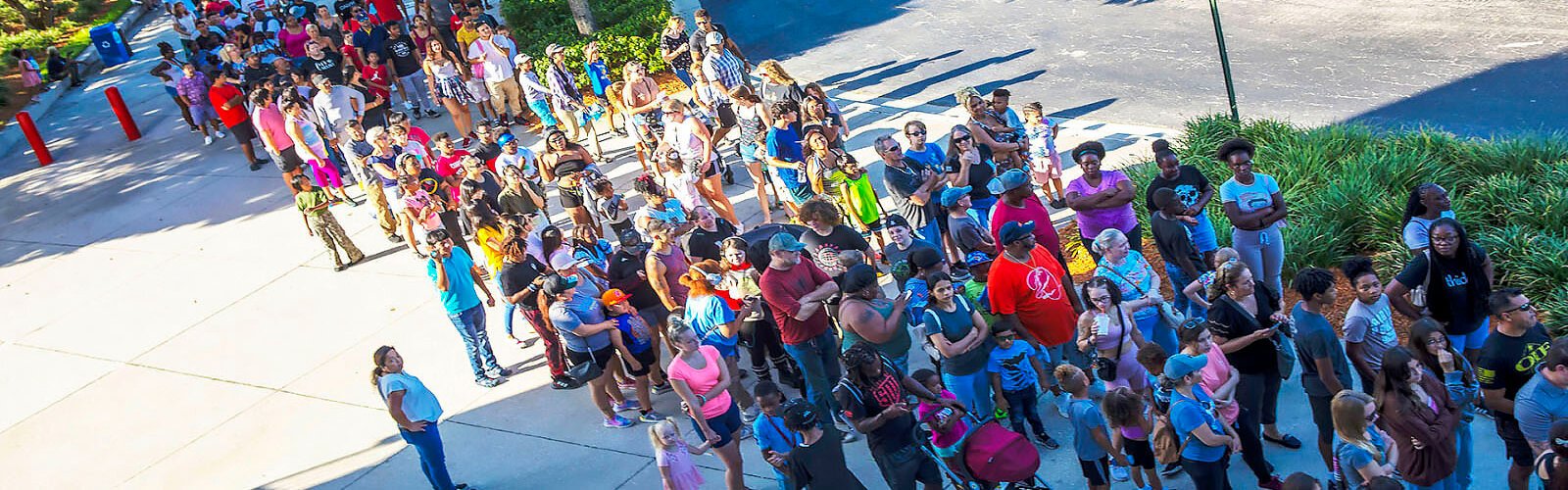 Families arrived early outside Raymond James Stadium for WWE Superstar and Global Ambassador Titus O'Neil/Thaddeus Bullard's Bullard Family Foundation 6th Annual Back to School Bash.