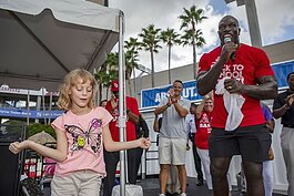 At the sixth annual Bullard Family Foundation Back to School Bash, Amberlee Kampourakis won a dance-off and Tampa Bay Buccaneers tickets for her family.