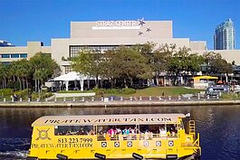 To get around downtown Tampa, we can walk or bike the Tampa Riverwalk, rent an e-bike, use the streetcar or take a ride on the Pirate Water Taxi, seen here on the Hillsborough River.