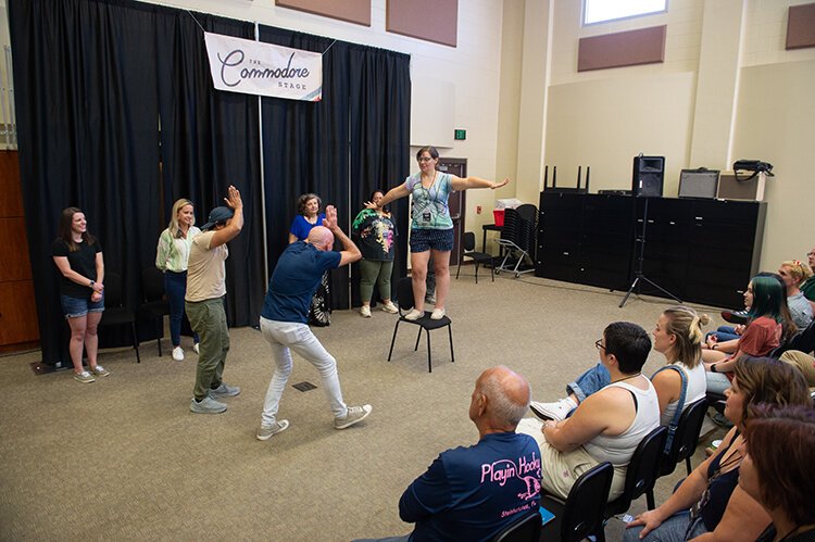 Improv comedians perform for one another before the Saturday night program starts at the 2023 Countdown Improv Festival.