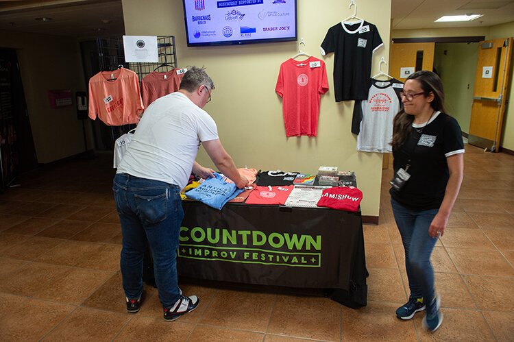 There were plenty of t-shirts for sale at the merchandise tables during the 2023 Countdown Improv Festival.