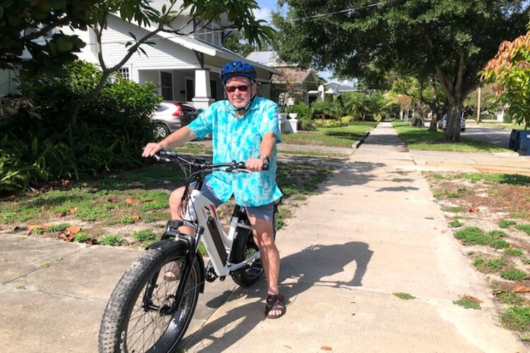 Longtime Hyde Park resident Paul Ganoung uses his e-bike for grocery shopping and other short trips. "It's easier than jumping in the hot car," he says.