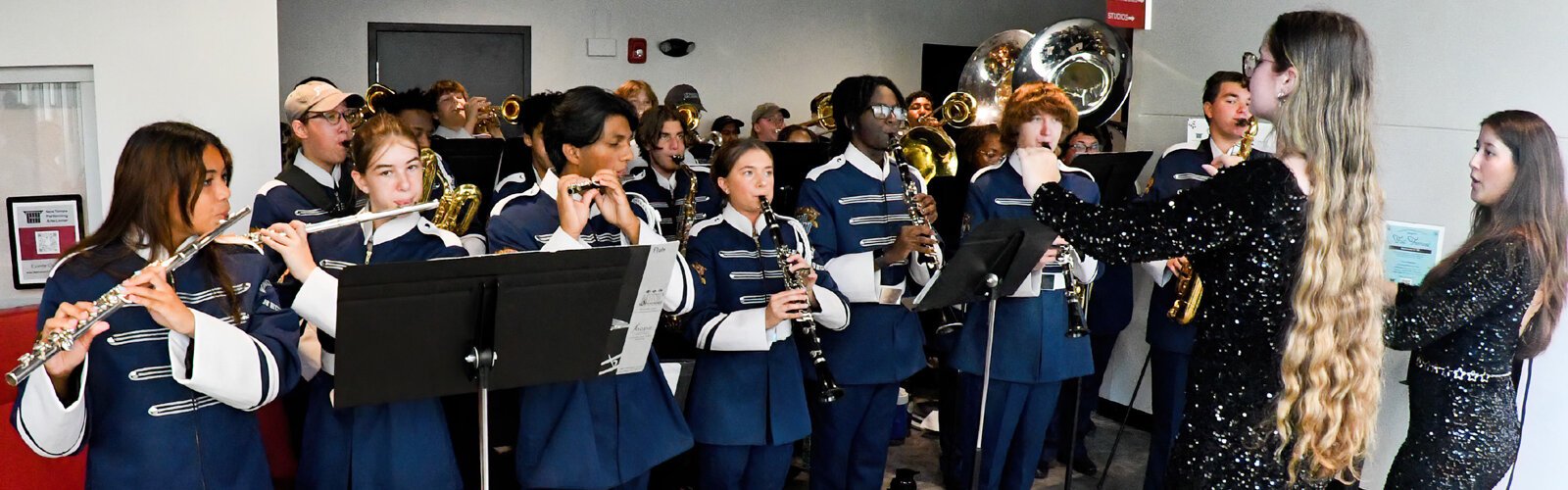 The Wharton High School Pep Band gives a sample of their repertoire in the lobby of the New Tampa Performing Arts Center during the inaugural Fall Festival.