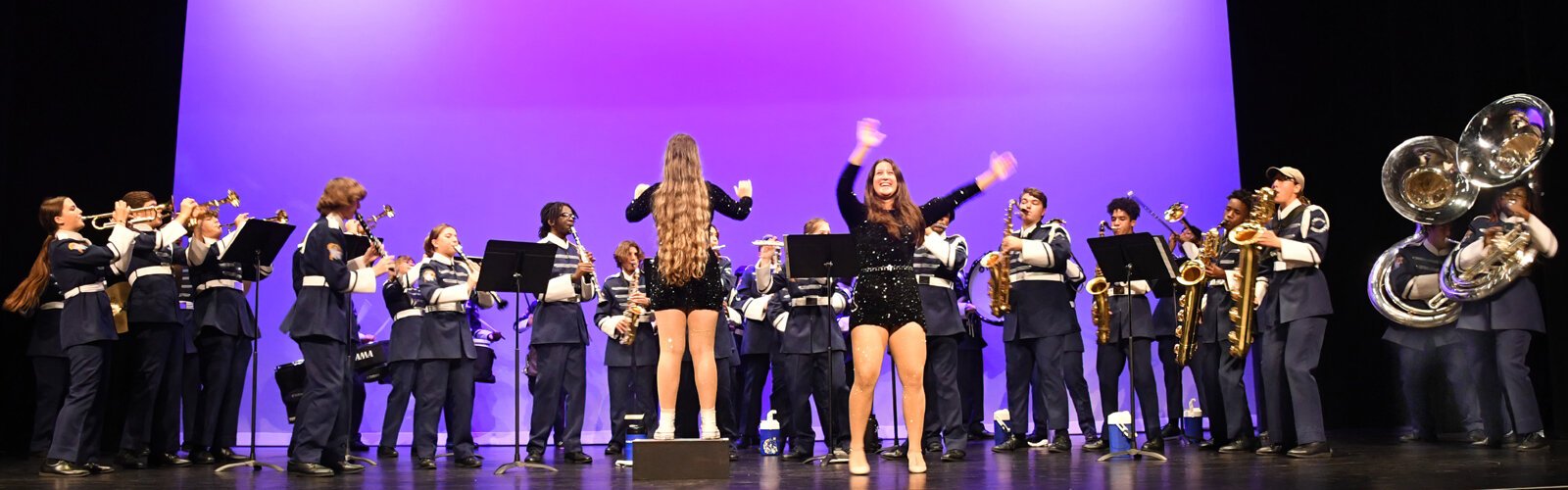 The Wharton High School Marching Band performs on stage in the theater of the New Tampa Performing Arts Center during the inaugural Fall Festival.