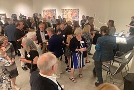 The Florida Museum of Photographic Arts celebrated the move to its new space in the Ybor Kress Building with a recent preview party.