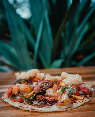 An octopus, shrimp and chicharron taco from Rene's Mexican Kitchen. The recipe is from Baja California in northwest Mexico.