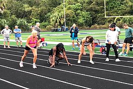 Cathy Coale,67, and other runners get ready for the start of the 50-meter race at the recent Tampa Bay Active Life Games,