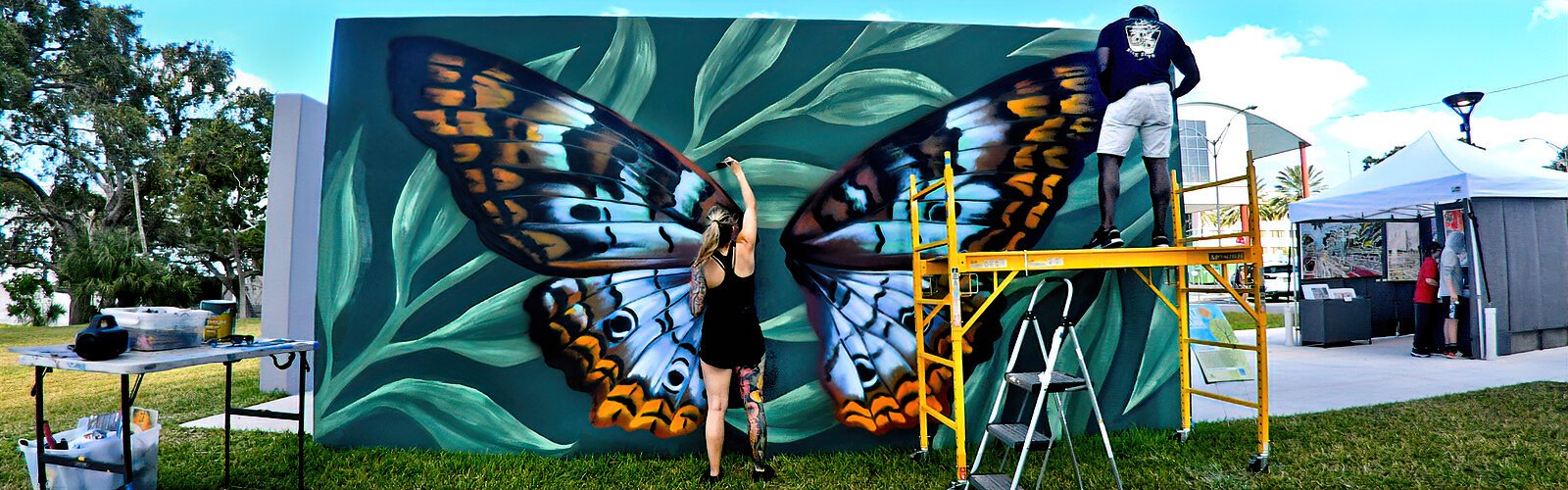 Artist Alyssa Dunlap puts the last touches to her live mural painting created for the Art in the Park celebration at Coachman Park in Clearwater in late October.