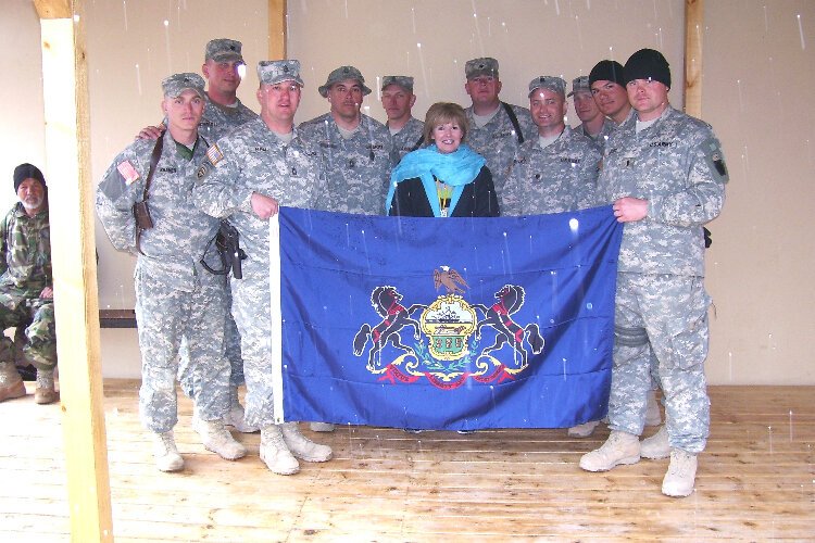 Pamela Varkony with members of the Pennsylvania National Guard