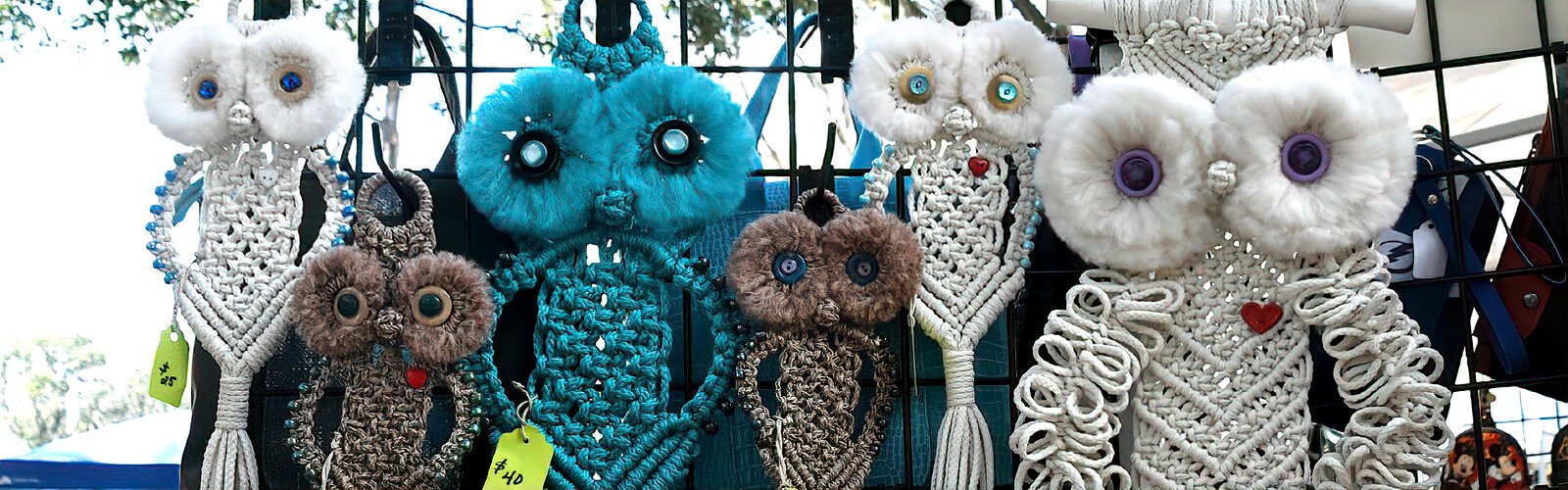 Showcased at the Sew Fine Sewing & Embroidery booth, the macrame owls of Lorraine Kaelin blend well with the other creatures of the Wonders of Wildlife estival. 