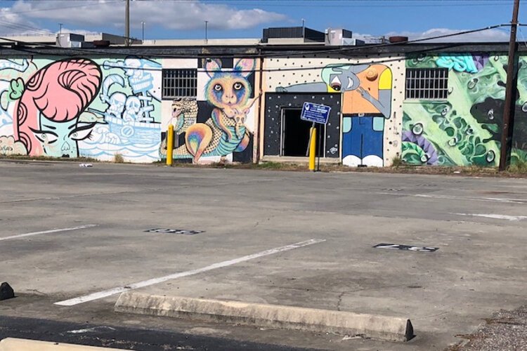 Colorful murals along North Franklin Street, or Yellow Brick Row, are part of the unique vibe in Tampa Heights.