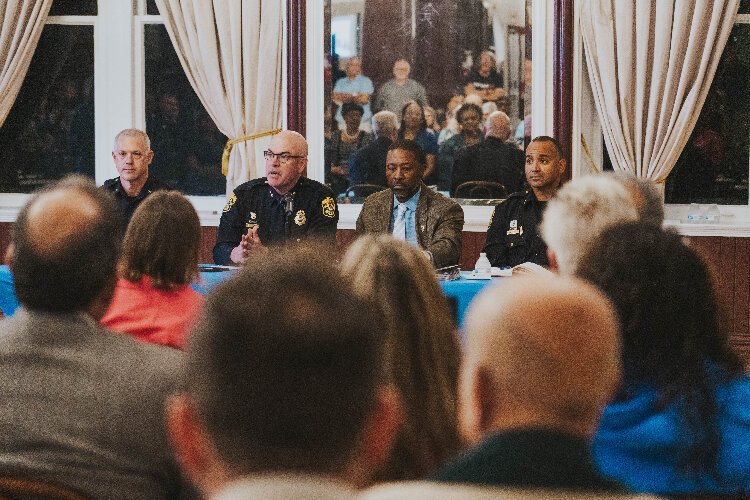 Tampa Police Chief Lee Bercaw and department leaders at a community town hall following the Halloween weekend shooting in Ybor City.