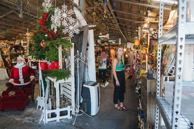 During the holiday season, shoppers check out Vintage Roost in Ybor City.