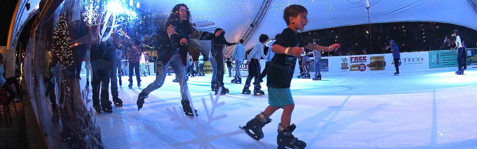 At Curtis Hixon Waterfront Park in Tampa, Winter Village's ice skating rink is a popular attraction this December.