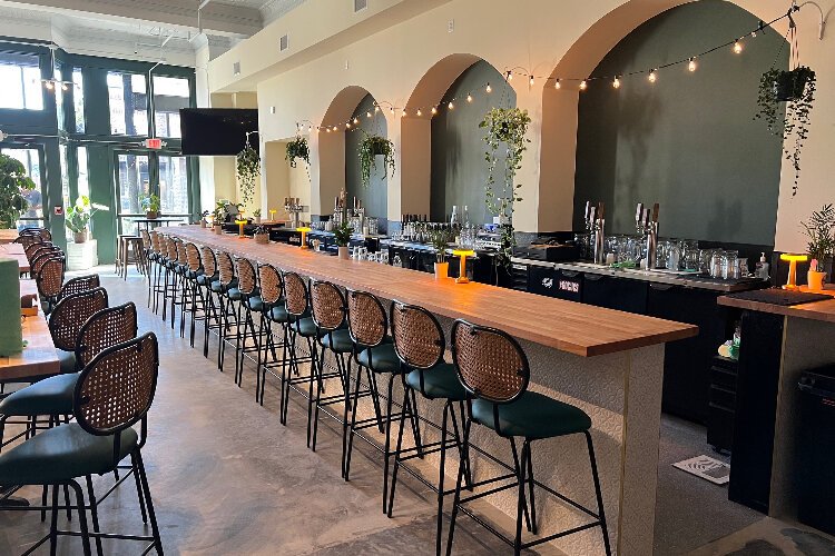 Joel Bigham set out to make the look and feel of his new beer and wine bar Trellis at Buchman "lighter and brighter" than other Ybor City bars.