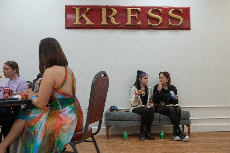 Brittaney Taylor and Ashleigh Robinson take a short snack break during the Whinge! Festival at the historic Ybor Kress Building.