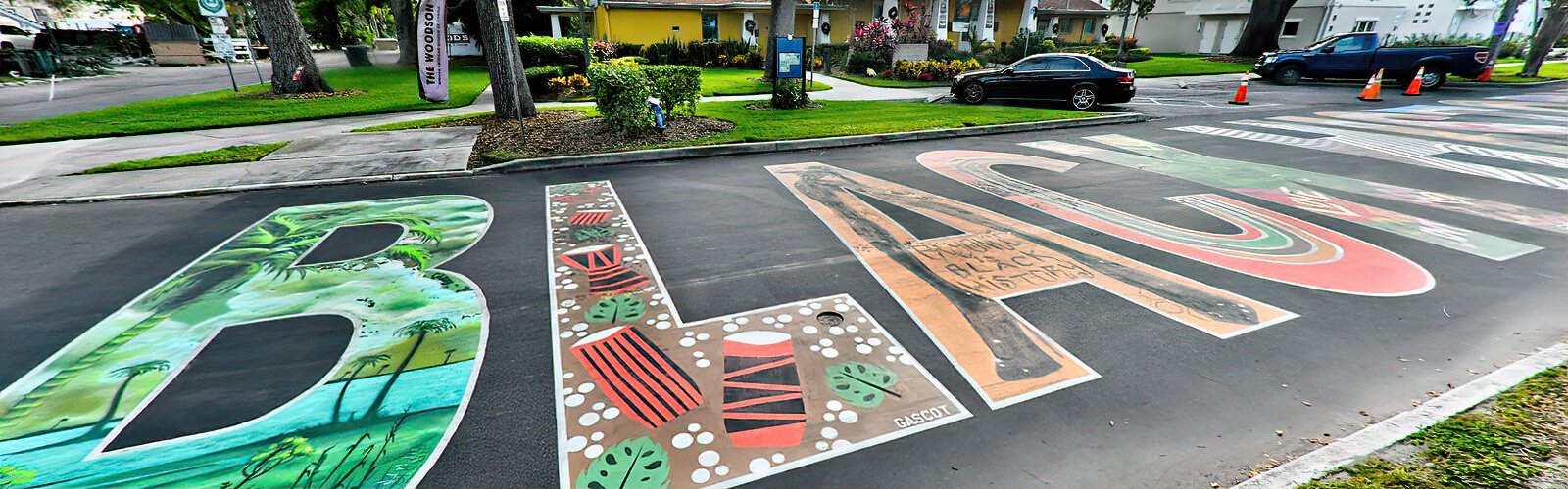 Showing support for Black history, a stunning BLACK HISTORY MATTERS mural was painted by 16 local artists in 2023 in front of the Carter G. Woodson African American Museum.