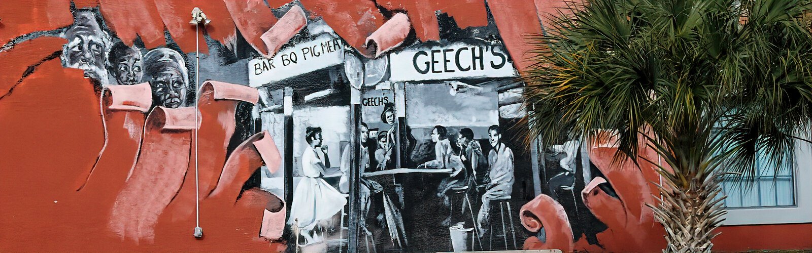One can almost smell the aroma of smoked barbecue from Geech’s, a popular restaurant from the segregation era depicted in this historical mural along 22nd Street South.