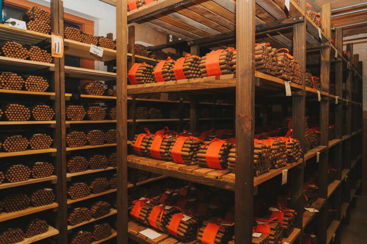 J.C. Newman ages cigars for a year or longer in the aging room of El Reloj.