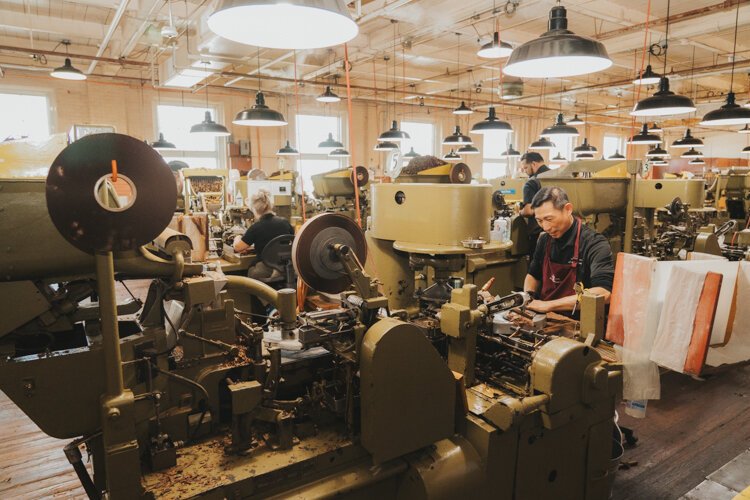 J.C. Newman workers machine roll cigars on the same equipment company founder Julius Caesar Newman purchased in 1930.