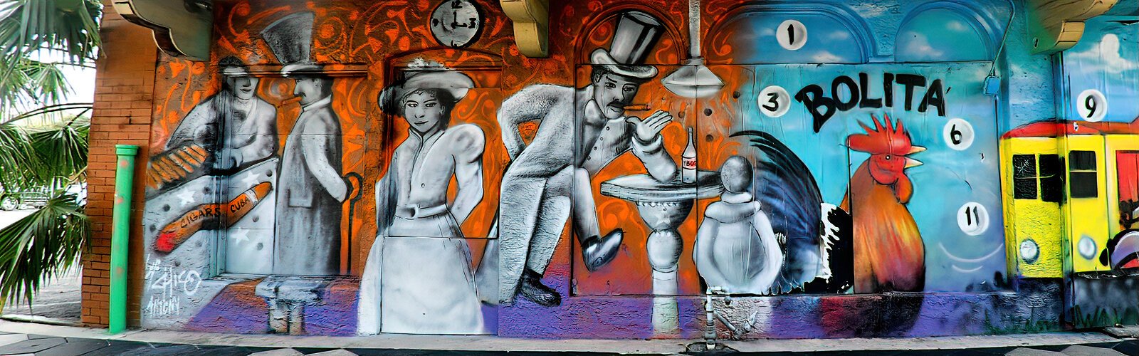 Vibrant murals reflect Ybor’s history and magnetic charm.