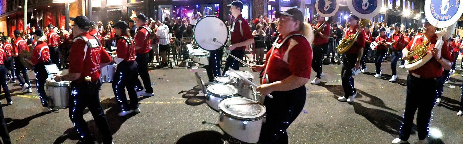 The Awesome Original Second Time Arounders Marching Band of St. Petersburg marches down Ybor City's Seventh Avenue during the Sant’ Yago Knight Parade.
