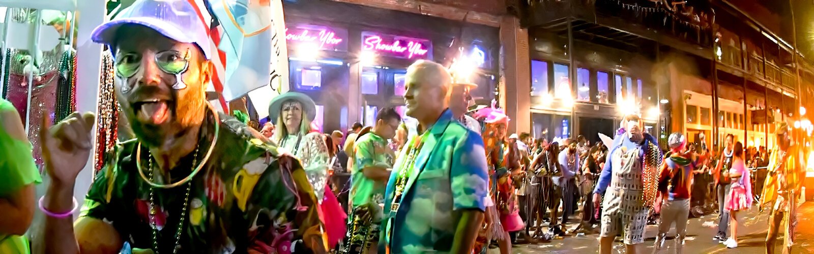 Members of the Krewe of the Conch Republic partake in the merriment of the Sant’ Yago Knight Parade, complete with special face make-up.